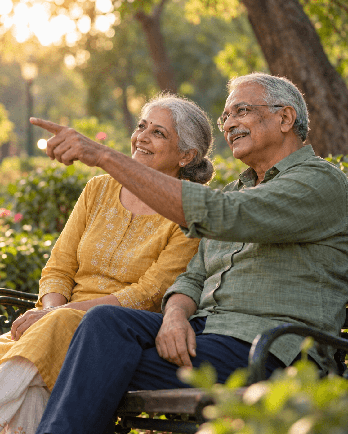 A senior couple smiling together in a garden